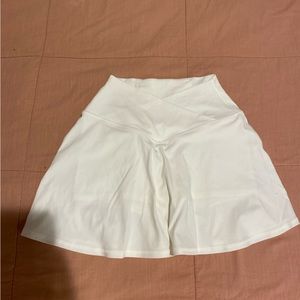 White crossover tennis skirt.